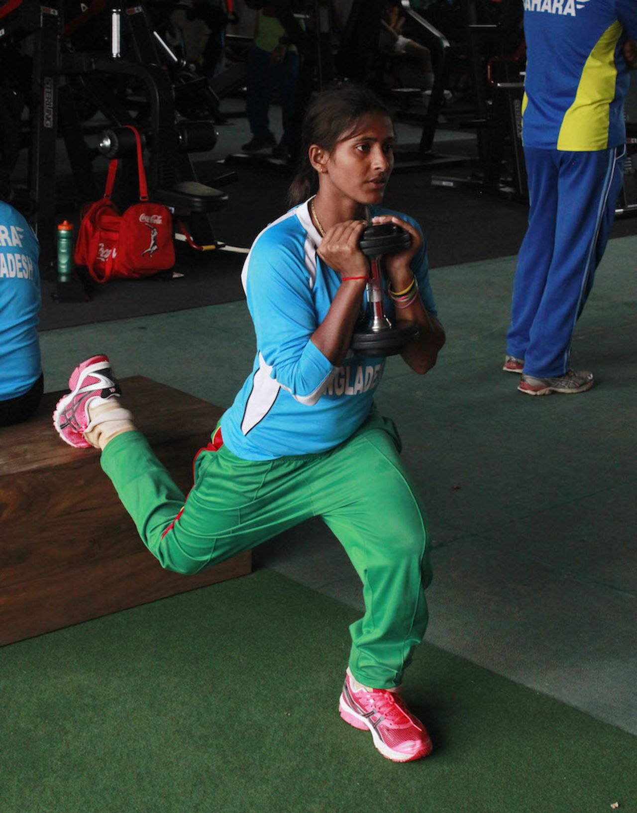 Lata Mondal stretches with a dumbbell, Mirpur, August 16, 2014
