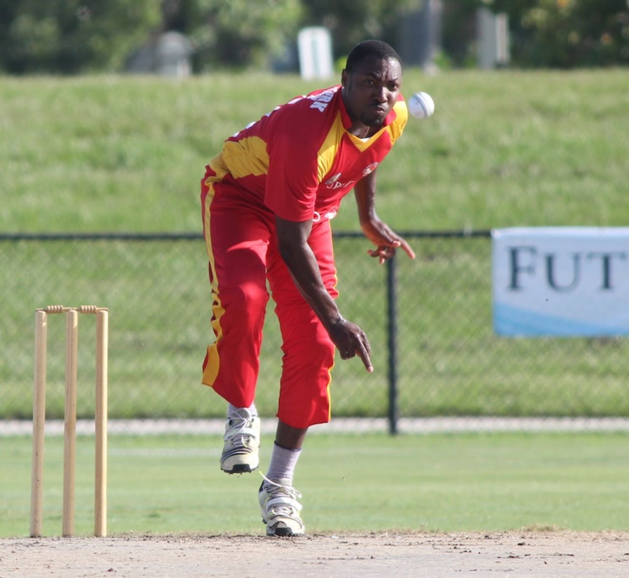 George Adams sends in a delivery, New York v South West, USACA T20 National Championship, Lauderhill, August 16, 2014
