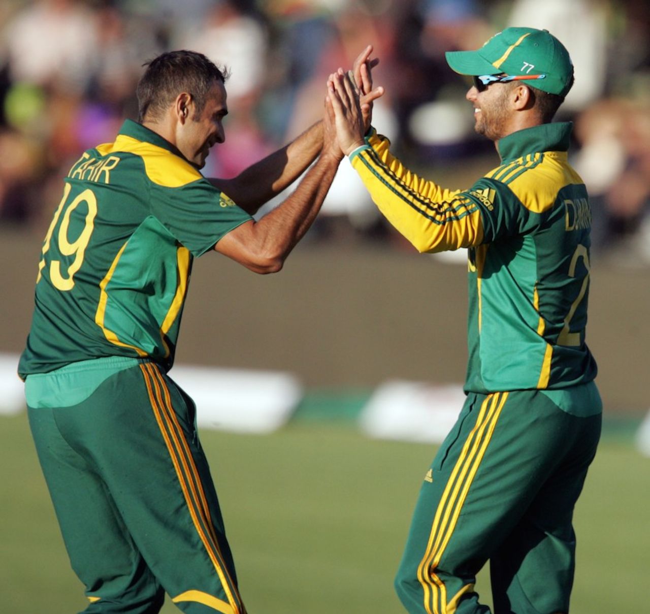 Imran Tahir is congratulated by JP Duminy after a wicket, Zimbabwe v South Africa, 1st ODI, Bulawayo, August 17, 2014