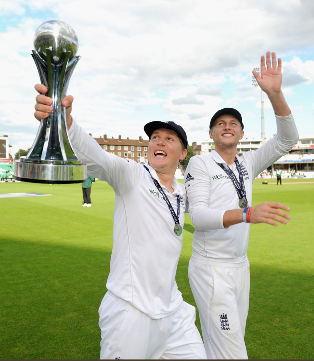 Joe Root and Gary Ballance celebrate with the series trophy, England v India, 5th Investec Test, The Oval, 3rd day, August 17, 2014