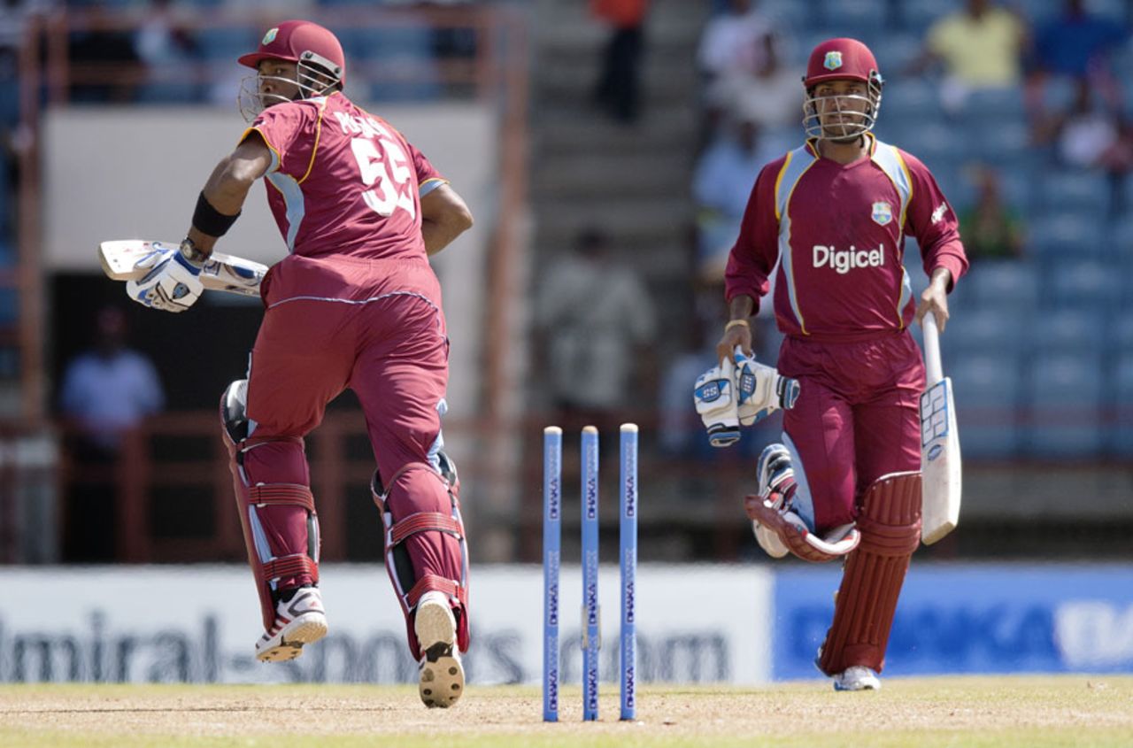 Kieron Pollard and Denesh Ramdin run between the wickets, West Indies v Bangladesh, 1st ODI, St George's, August 20, 2014