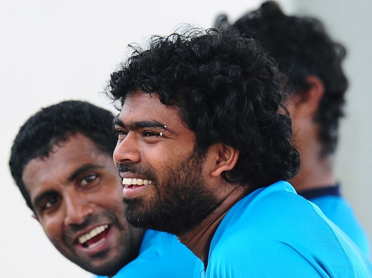 Lasith Malinga has a laugh during a net session on the eve of the first ODI against Pakistan, Hambantota, August 22, 2014