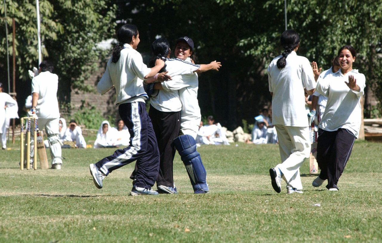 Kashmir college girls celebrate a wicket, Srinagar, September 13, 2005