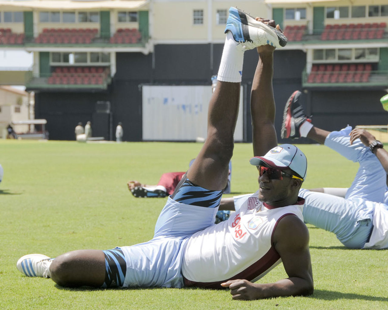 Darren Sammy does some stretching during training, Basseterre, August 24, 2014