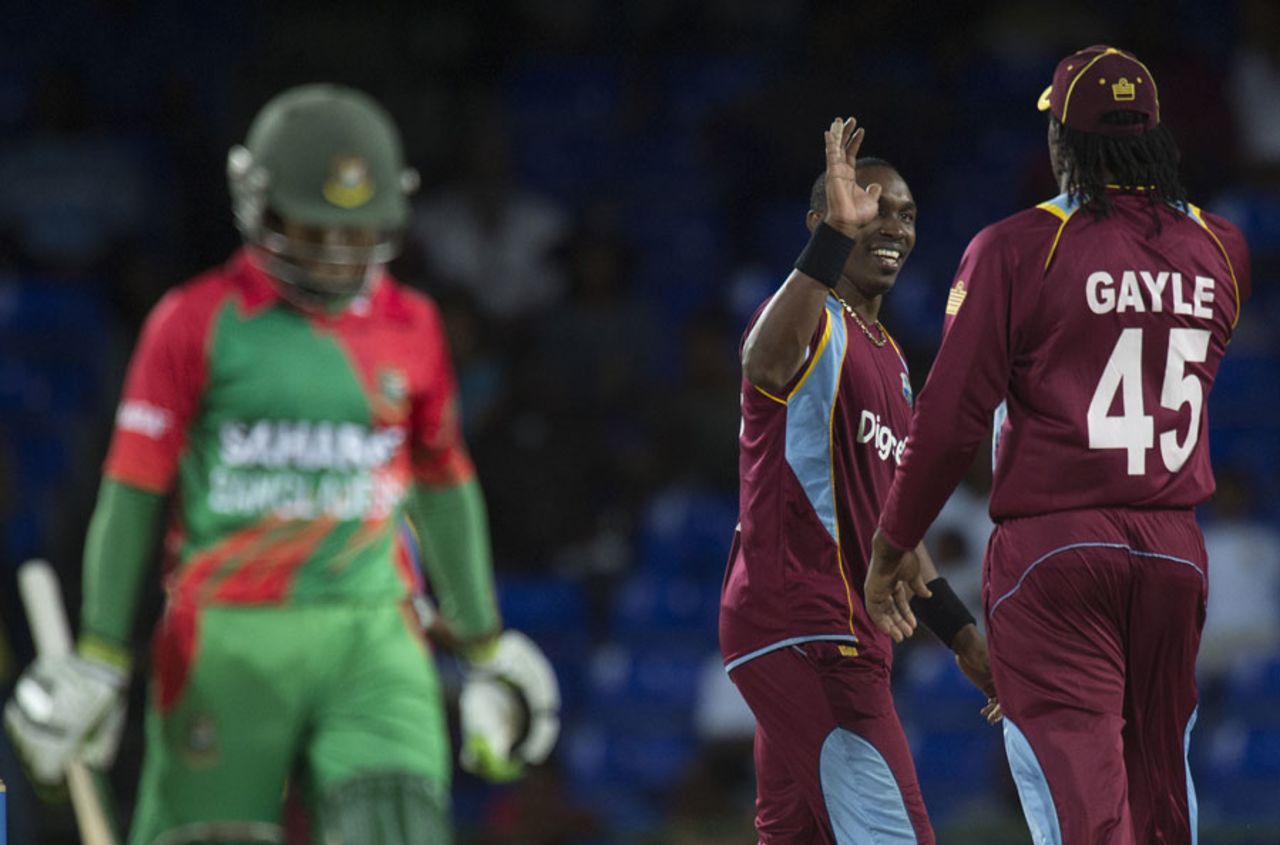 Dwayne Bravo celebrates the wicket of Mominul Haque, West Indies v Bangladesh, 3rd ODI, Basseterre, St Kitts, August 25, 2014