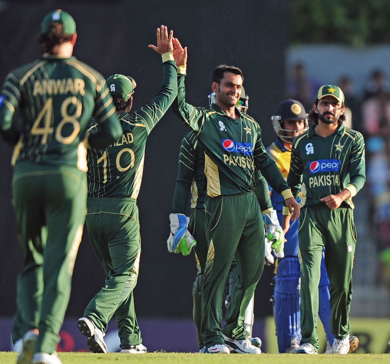 Mohammad Hafeez celebrates after dismissing Seekkuge Prasanna, Sri Lanka v Pakistan, 2nd ODI, Hambantota, August 26, 2014