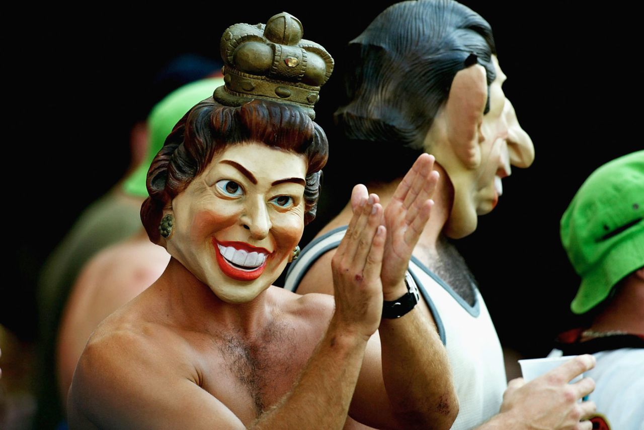 A fan wearing a Queen Elizabeth face mask enjoys the day, Australia v England, 1st Test, Brisbane, 4th day, November 10, 2002