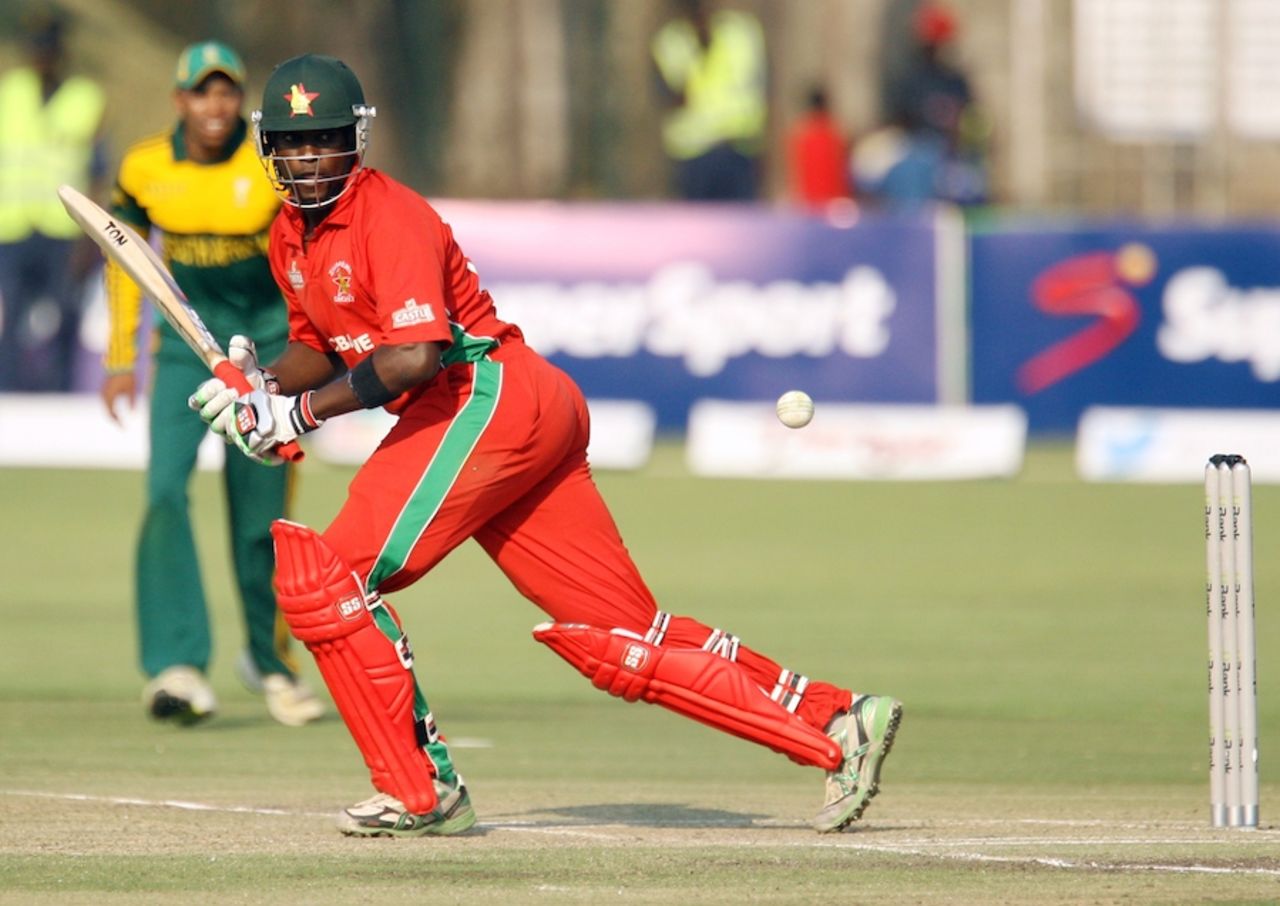Elton Chigumbura tucks the ball on the leg side, Zimbabwe v South Africa, tri-series, Harare, August 29, 2014