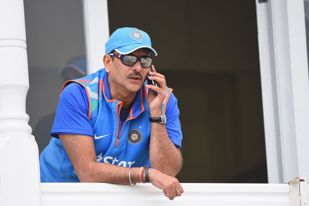 Ravi Shastri has a phone conversation during India's training session, Trent Bridge, August 29, 2014