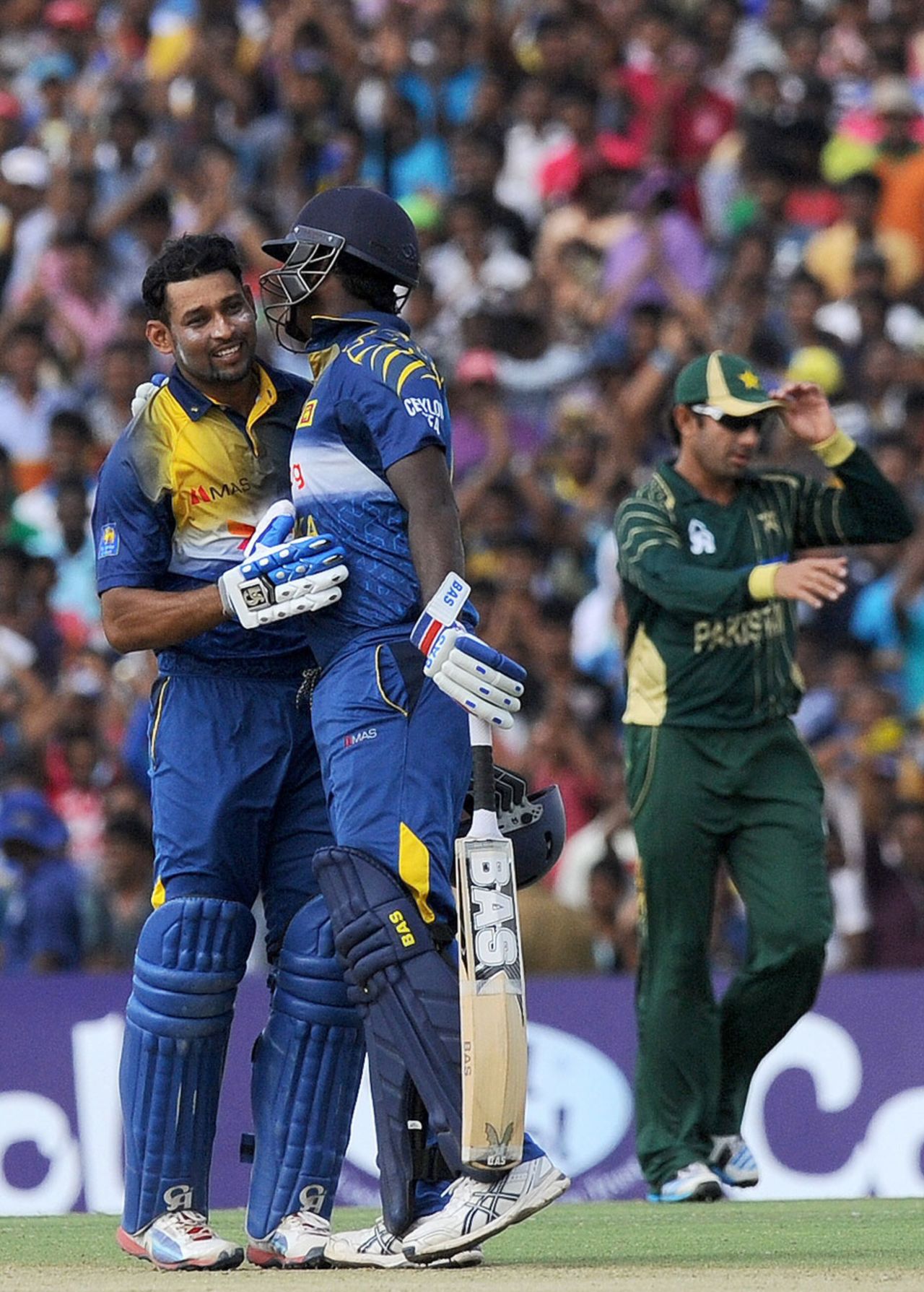 Tillakaratne Dilshan and Angelo Mathews embrace after Sri Lanka's win, Sri Lanka v Pakistan, 3rd ODI, Dambulla, August 30, 2014