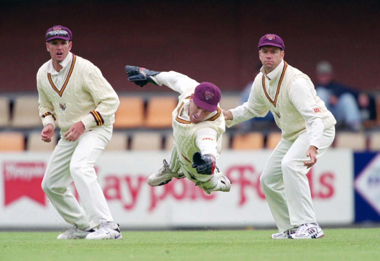 Queensland keeper Wade Seccombe dives, Tasmania v Queensland, Sheffield Shield, 1st day, Hobart, November 5, 1999