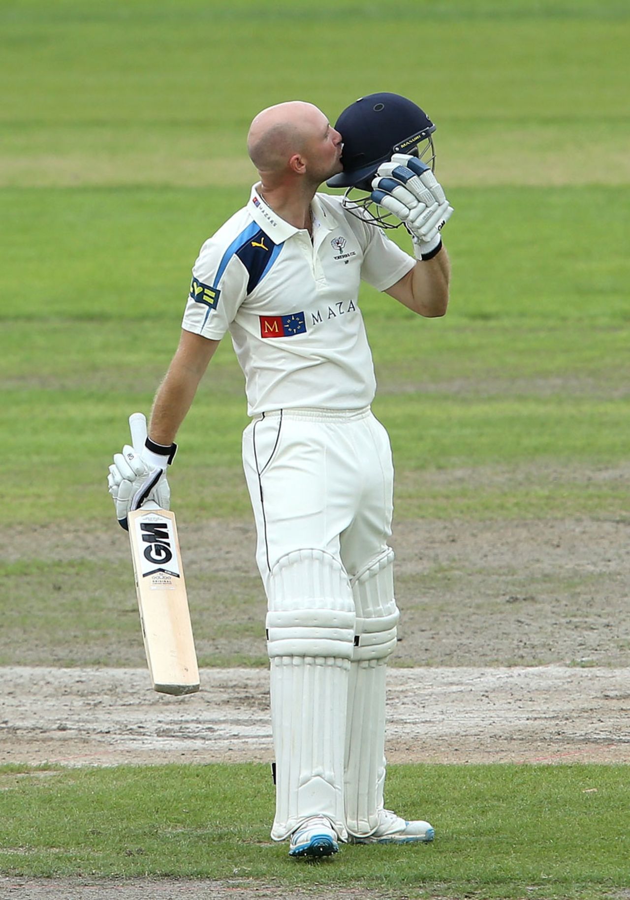 Adam Lyth kisses the badge on reaching his hundred, Lancashire v Yorkshire, County Championship, Division One, Old Trafford, September 1, 2014