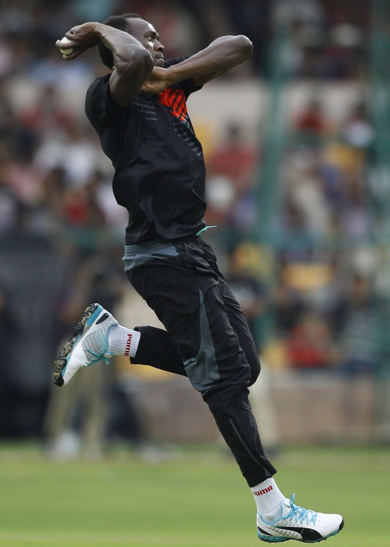 Usain Bolt in his delivery stride, Bangalore, September 2, 2014