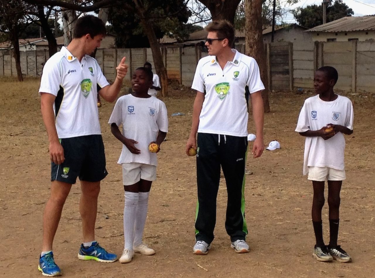 Mitchell Marsh and James Faulkner visited a school to run a cricket clinic, Harare, September 3, 2014