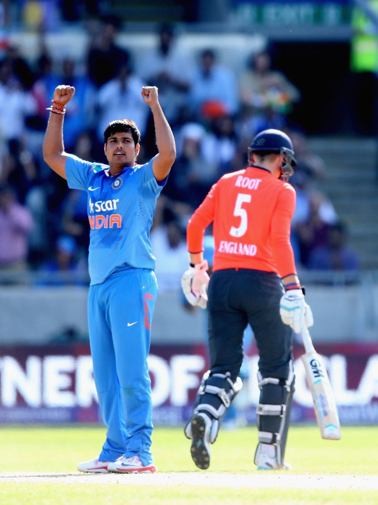 Karn Sharma celebrates his maiden international wicket, England v India, only T20, Edgbaston, September 7, 2014