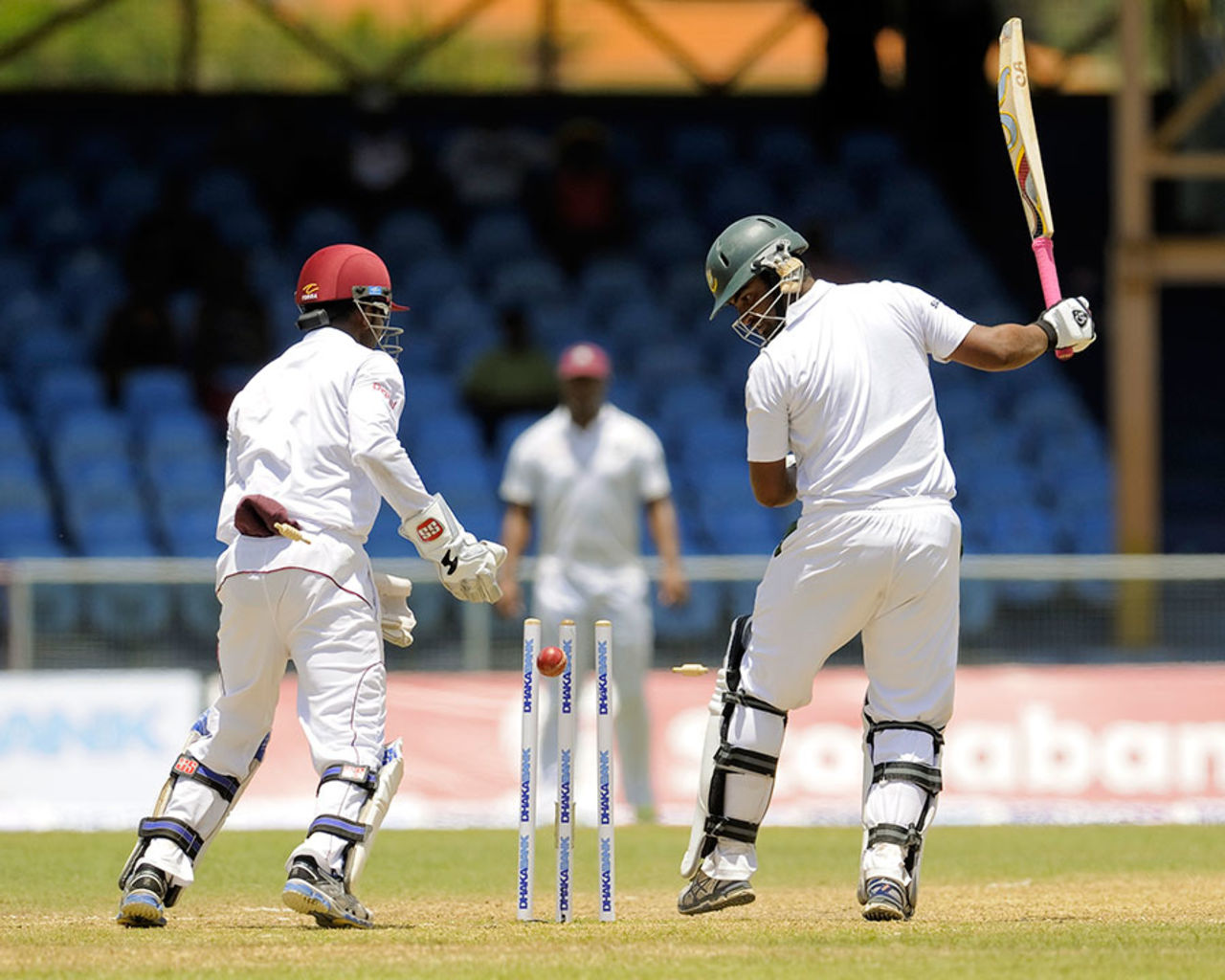 Tamim Iqbal looks back as Sulieman Benn turns one sharply to disturb his stumps, West Indies v Bangladesh, 1st Test, St. Vincent, 4th day, September 8, 2014