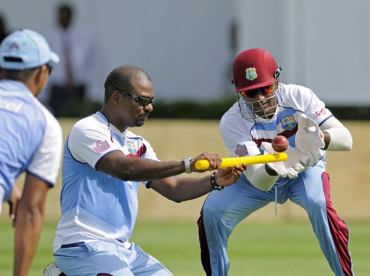 Denesh Ramdin gets some catching practice during a training session, Gros Islet, St Lucia, September 11, 2014