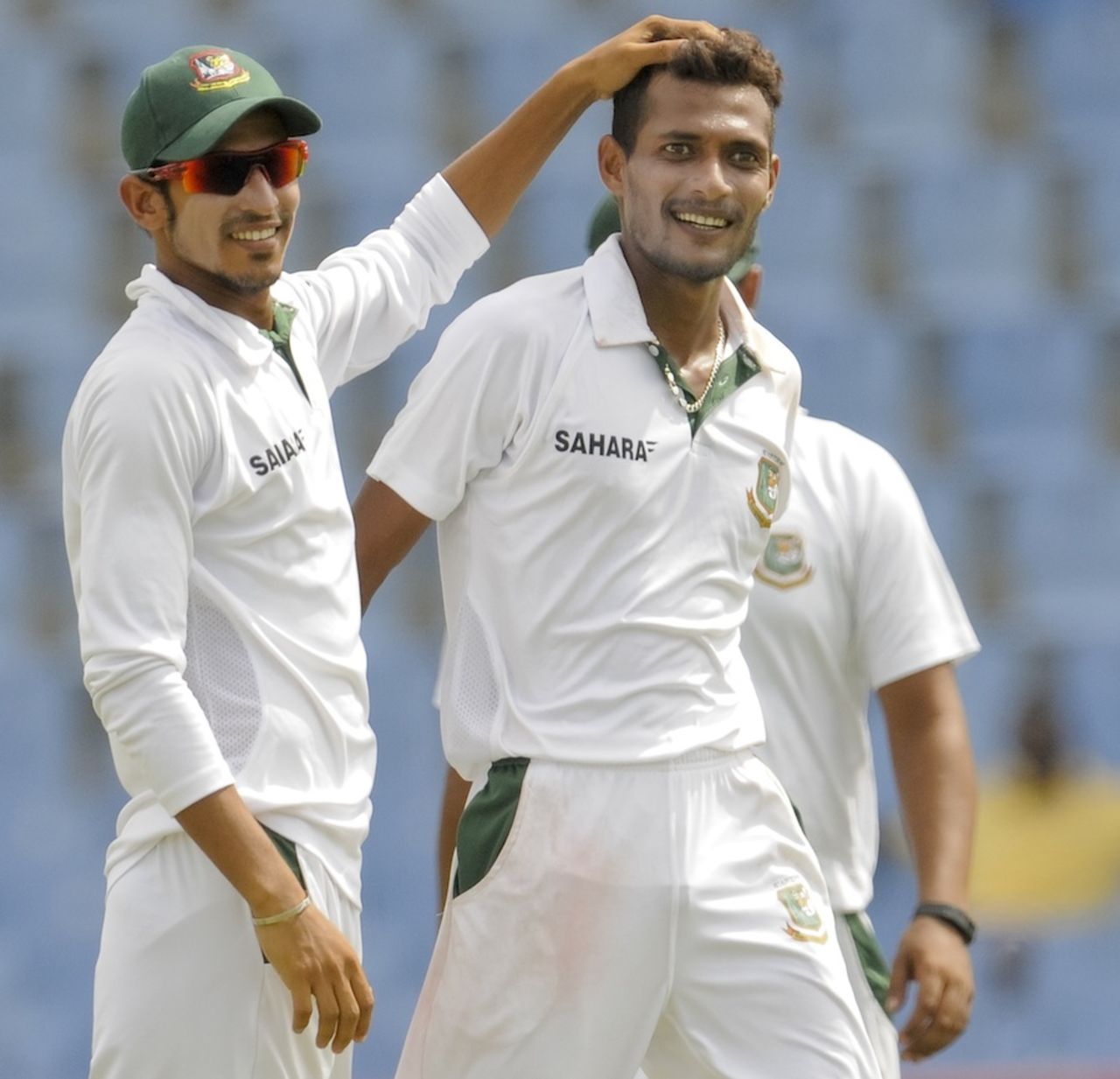 Nasir Hossain congratulates Shafiul Islam on a wicket, West Indies v Bangladesh, 2nd Test, St Lucia, 1st day, September 13, 2014