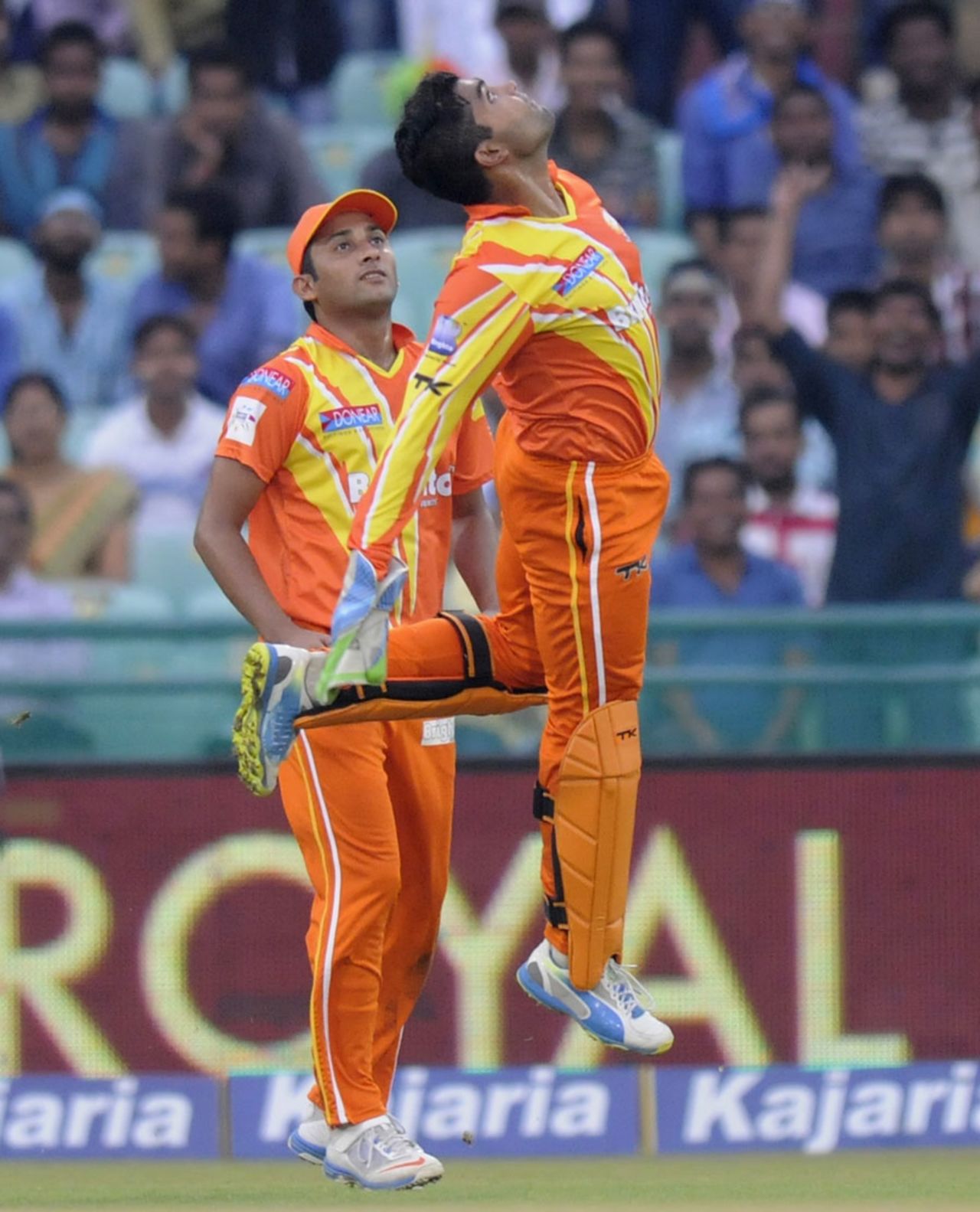 Umar Akmal exults after taking the catch to dismiss Kane Williamson, Northern Knights v Lahore Lions, CLT20, Raipur, September 14, 2014