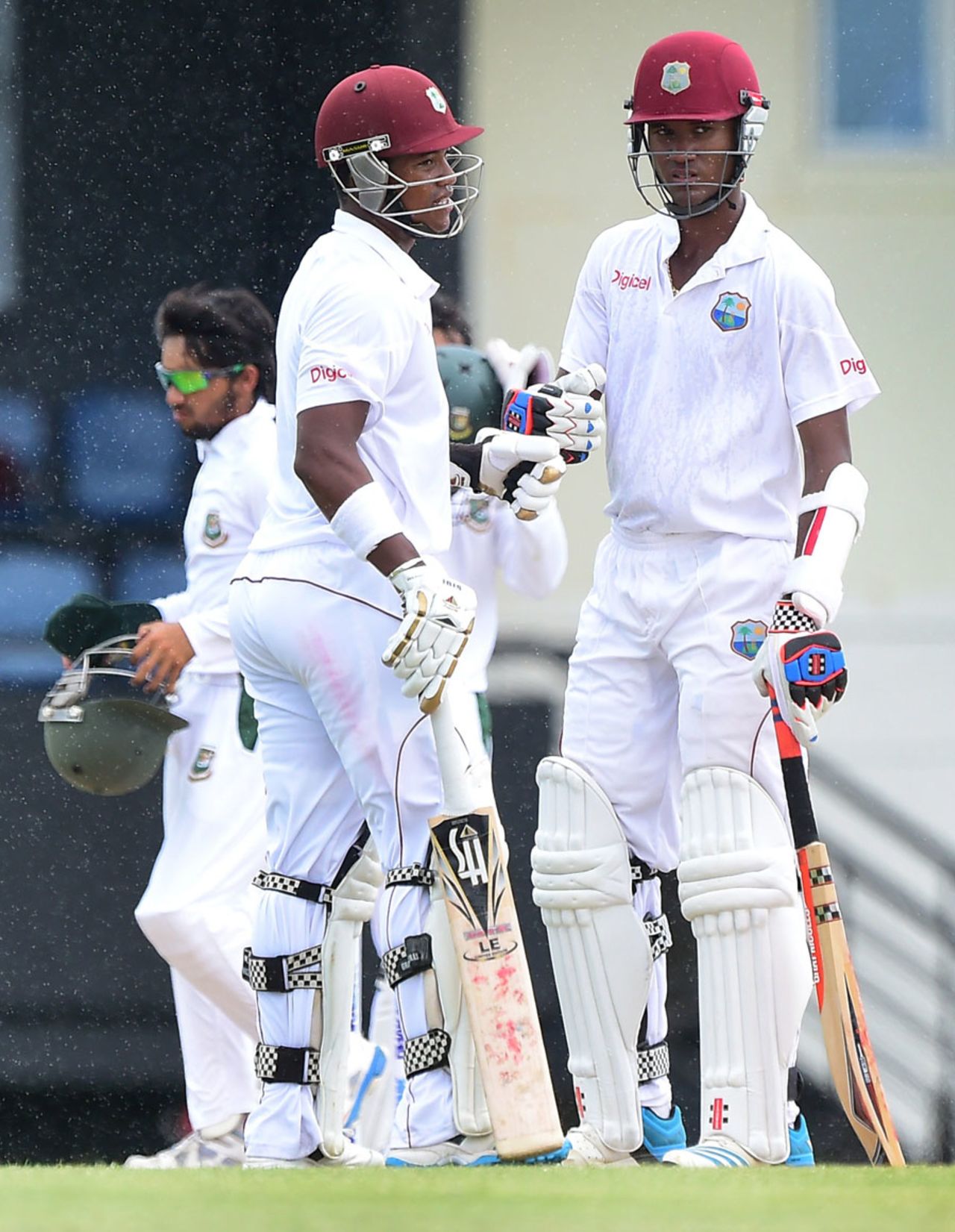 Kraigg Brathwaite and Leon Johnson punch gloves, West Indies v Bangladesh, 2nd Test, St. Lucia, 3rd day, September 15, 2014