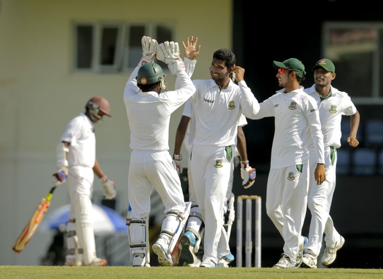 Mahmudullah is congratulated after a wicket, West Indies v Bangladesh, 2nd Test, St. Lucia, 3rd day, September 15, 2014