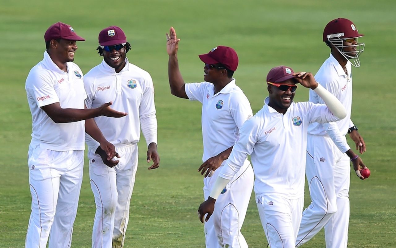 West Indies players celebrate the fall of a wicket, West Indies v Bangladesh, 2nd Test, St. Lucia, 4th day, September 16, 2014