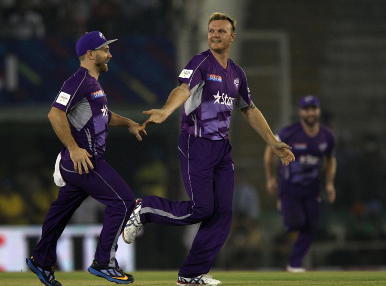 Doug Bollinger is all smiles after a wicket, Kings XI Punjab v Hobart Hurricanes, Champions League T20, Mohali, September 18, 2014