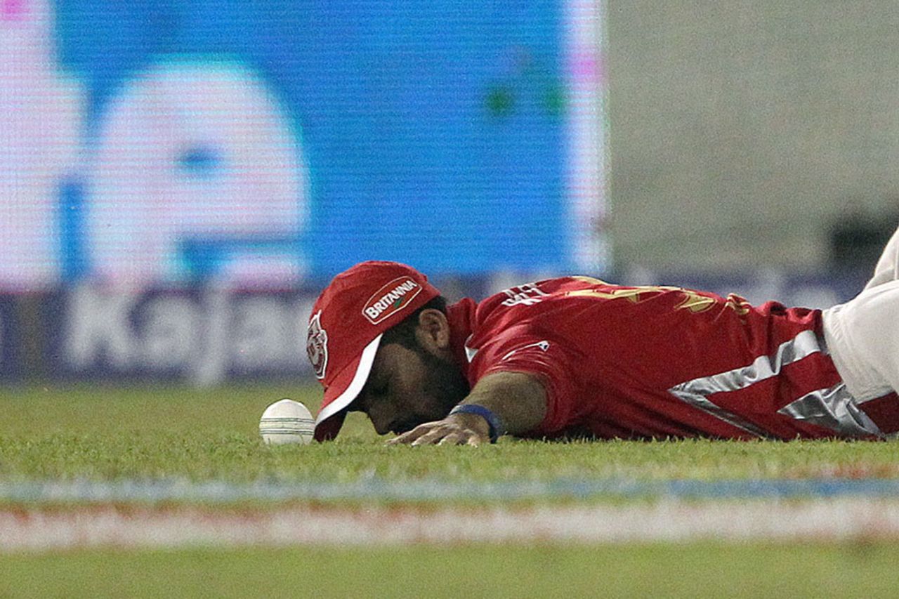 Manan Vohra is distraught after dropping Dilshan Munaweera, Kings XI Punjab v Barbados Tridents, Champions League T20, Mohali, September 20, 2014