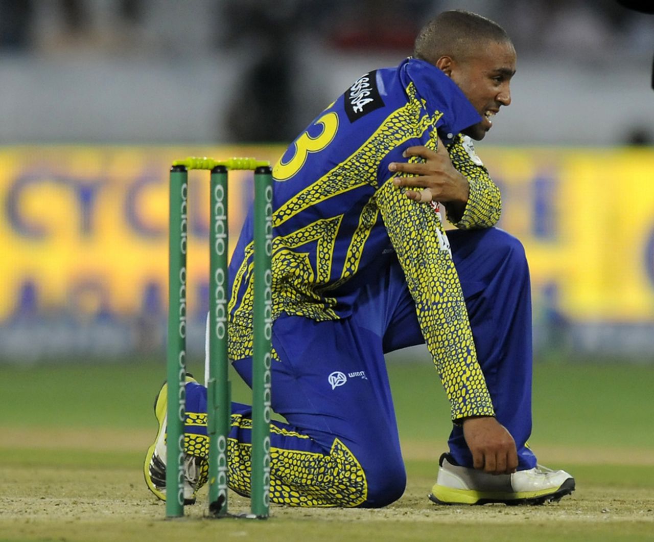 Dane Piedt injured his right arm while trying to field off his own bowling, Cape Cobras v Hobart Hurricanes, Champions League T20, Hyderabad, September 21, 2014