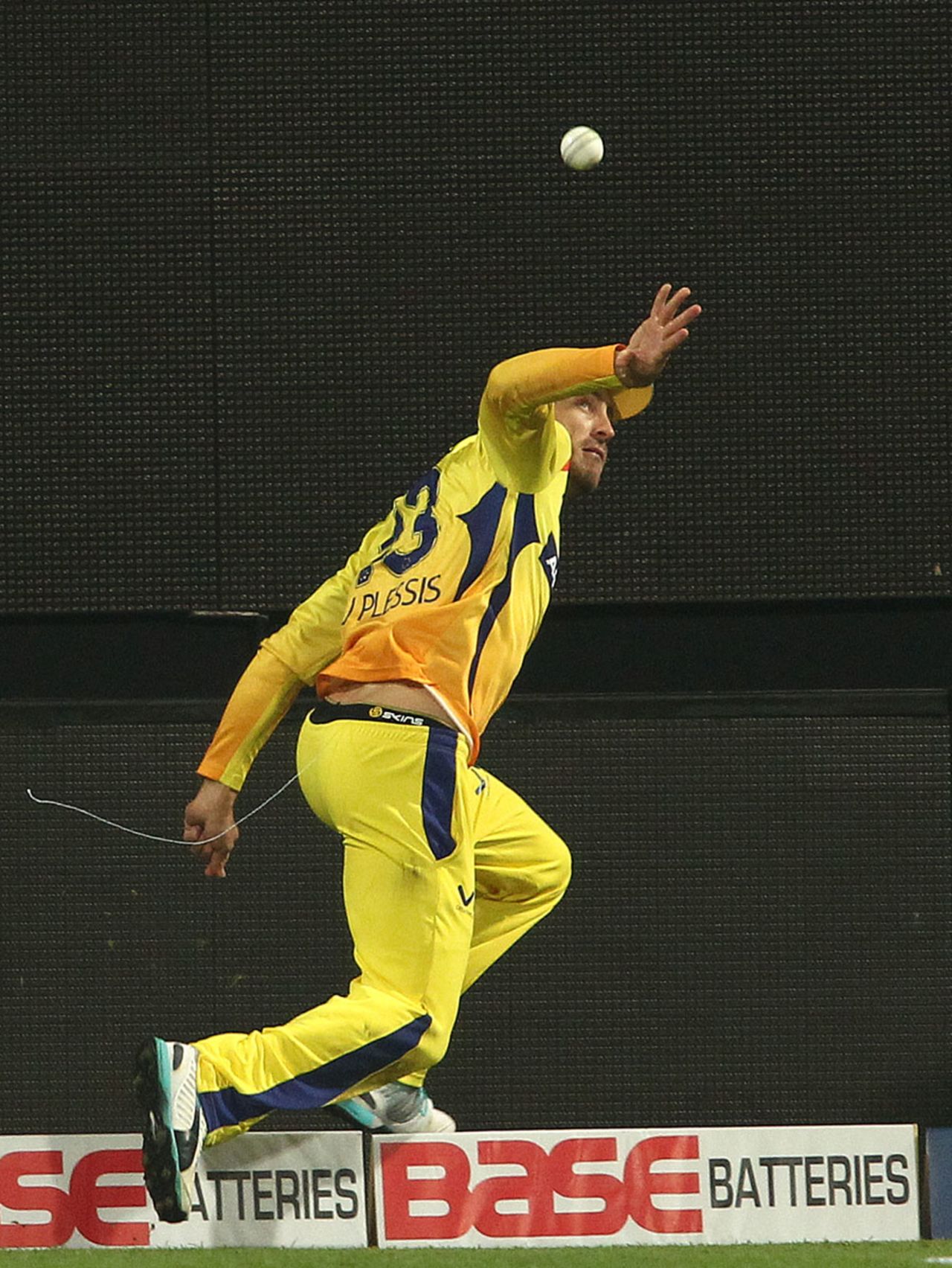 Faf du Plessis attempts to prevent a boundary, Chennai Super Kings v Dolphins, CLT20, Group A, Bangalore, September 22, 2014