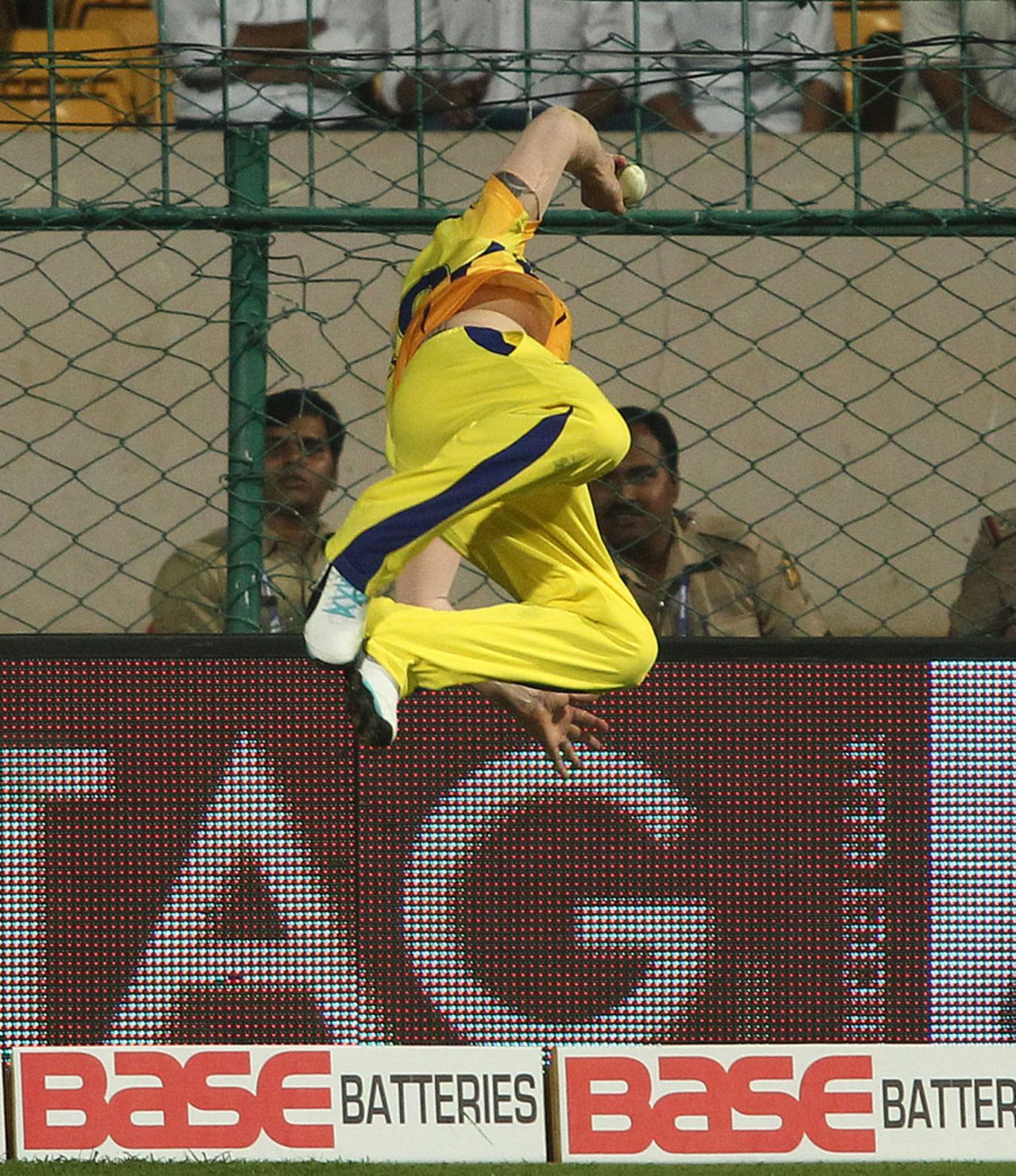Part 3 - Brendon McCullum twists his body after catching the ball, Chennai Super Kings v Dolphins, CLT20, Group A, Bangalore, September 22, 2014