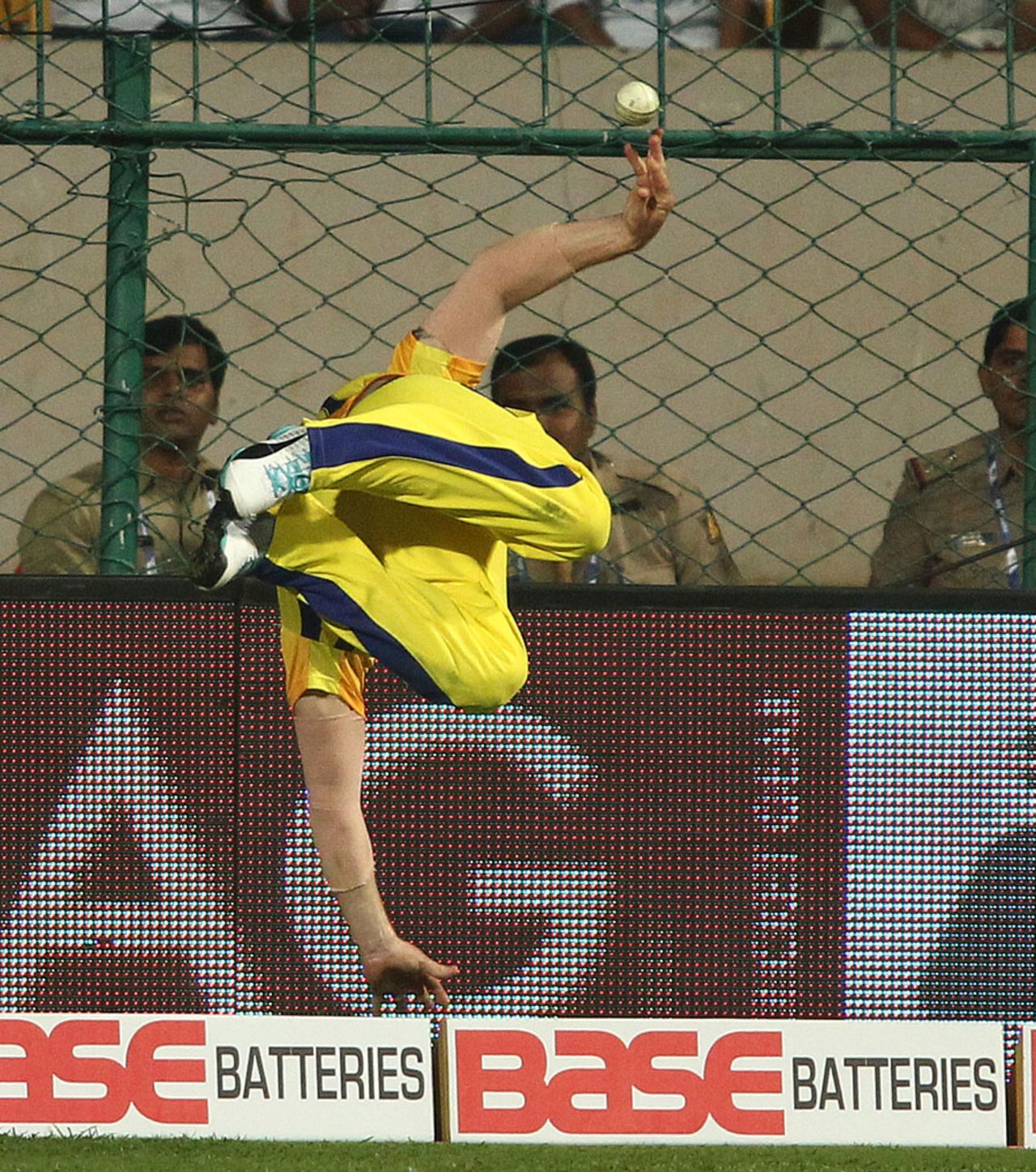 Part 4 - Brendon McCullum throws the ball back into play with his right hand, before breaking his fall with his left, Chennai Super Kings v Dolphins, CLT20, Group A, Bangalore, September 22, 2014