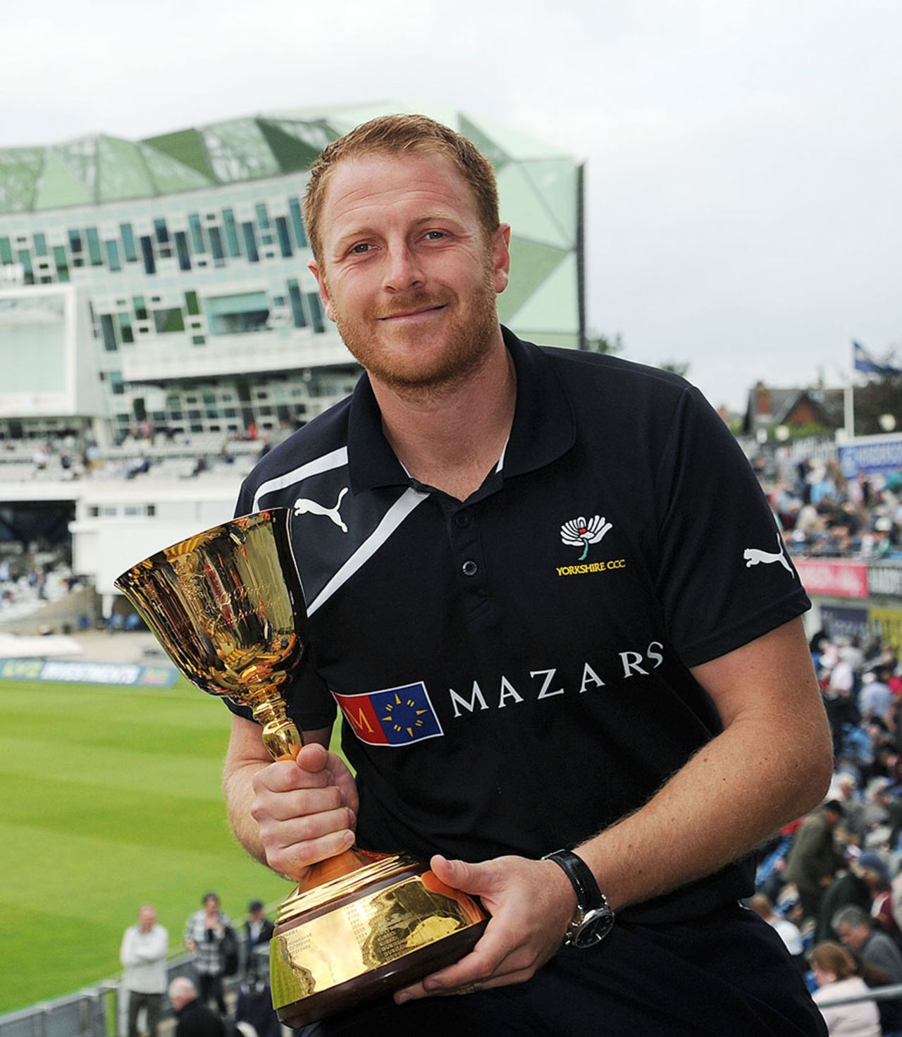 A defiant Andrew Gale holds the Championship trophy at Headingley, Yorkshire v Somerset, County Championship Division One, Headingley, 1st day, September 23, 2014