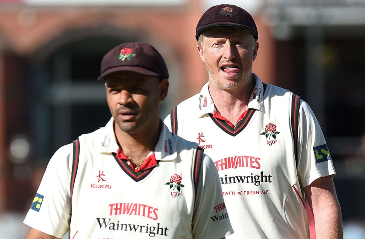 Ashwell Prince and Glen Chapple walk off the ground, Lancashire v Middlesex, County Championship, Division One, Old Trafford, September 26, 2014