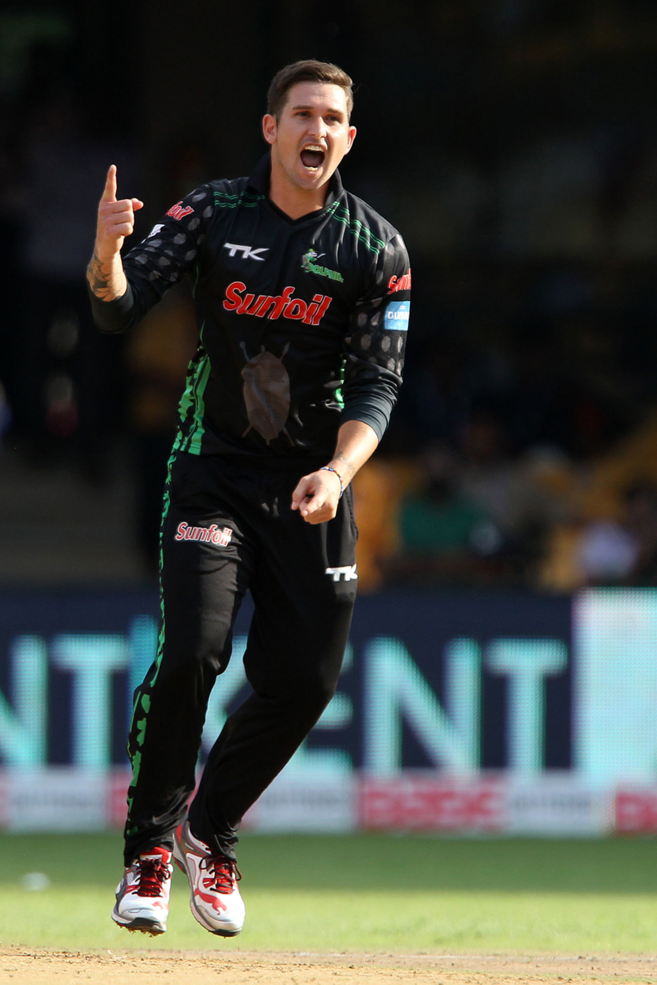 Cameron Delport is pumped up after bowling Mohammad Hafeez, Dolphins v Lahore Lions, Champions League T20, Bangalore, September 27, 2014