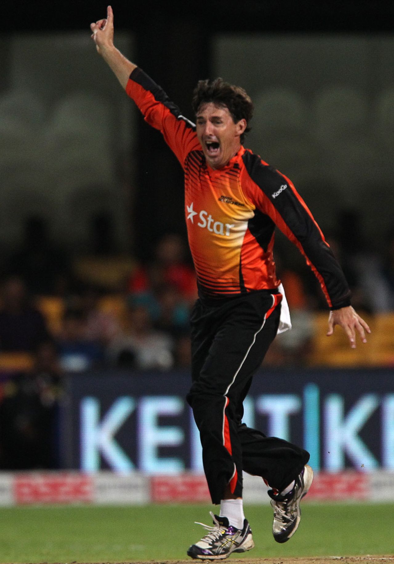 Brad Hogg is excited after removing Mithun Minhas, Chennai Super Kings v Perth Scorchers, Champions League T20, Bangalore, September 27, 2014