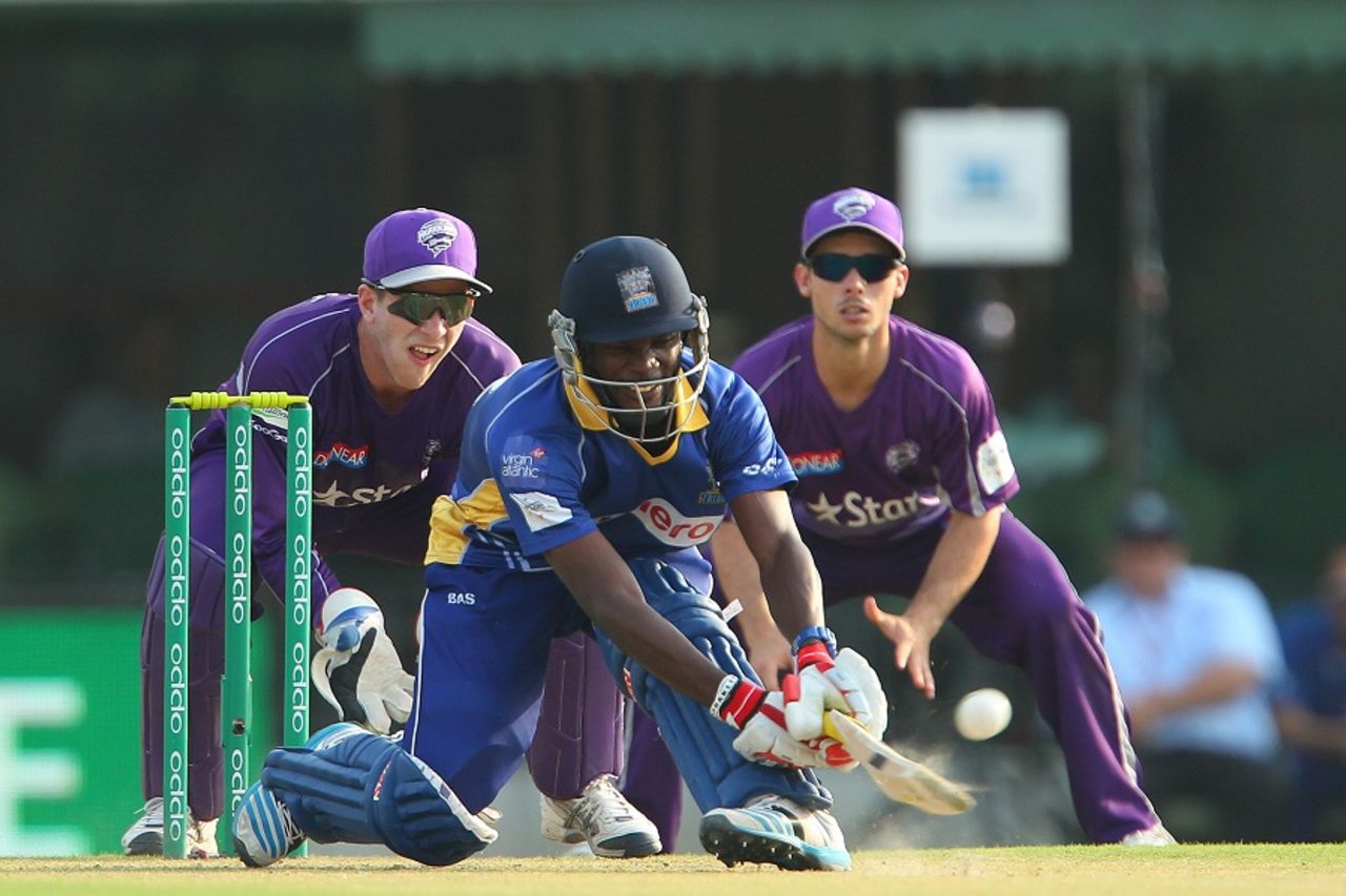 Jonathan Carter goes for a reverse sweep, Barbados Tridents v Hobart Hurricanes, Champions League T20, Mohali, September 28, 2014