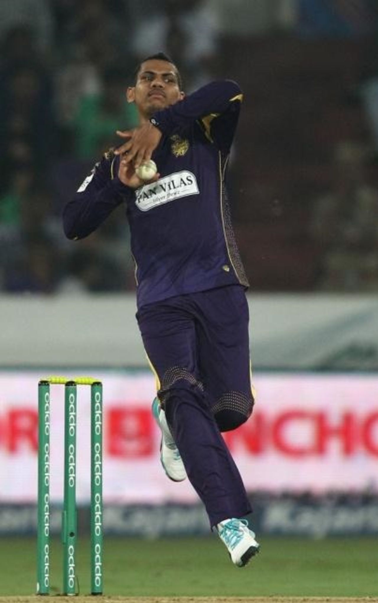 Sunil Narine approaches the crease during his spell, Dolphins v Kolkata Knight Riders, Champions League T20, Group A, Hyderabad, September 29, 2014