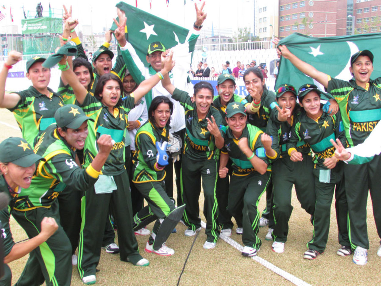 The victorious Pakistan Women's team celebrate after securing the gold medal, Incheon, September 30, 2014