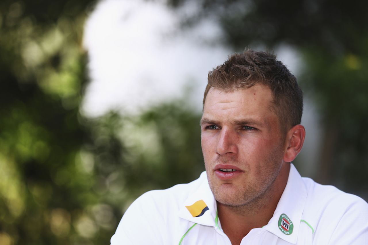 Aaron Finch talks to the press after arriving in the UAE, Dubai, September 30, 2014