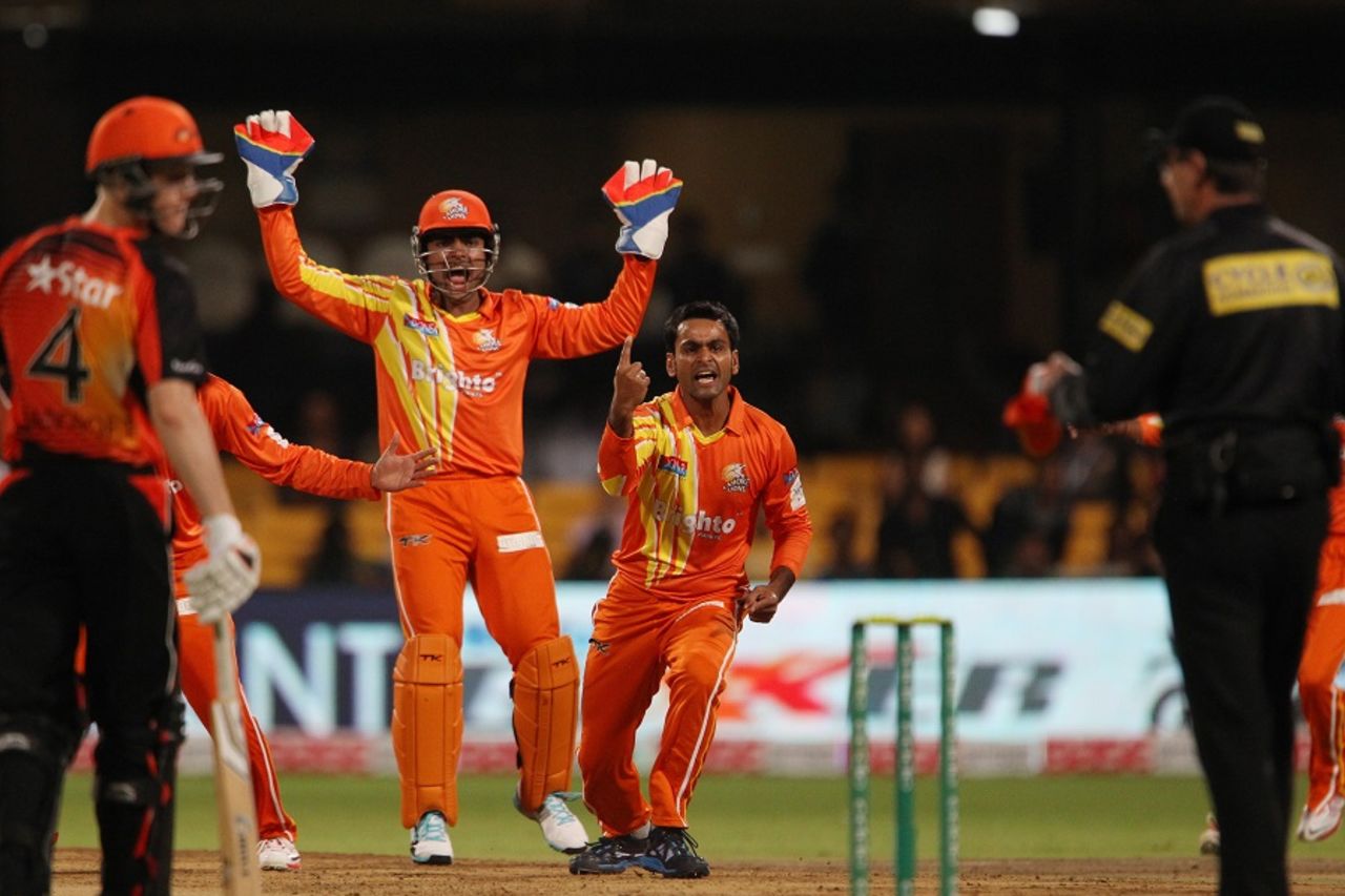 Mohammad Hafeez is in disbelief as umpire Rod Tucker turns him down, Lahore Lions v Perth Scorchers, Champions League T20, Group A, Bangalore, September 30, 2014
