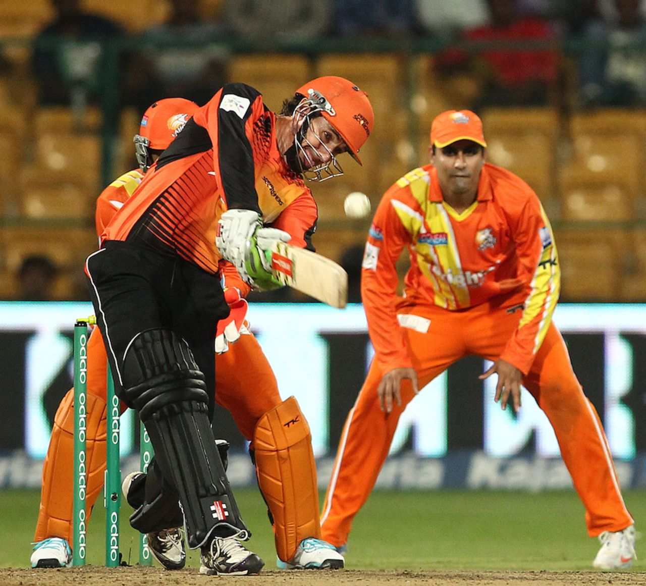 Brad Hogg carts one over the infield, Lahore Lions v Perth Scorchers, Champions League T20, Group A, Bangalore, September 30, 2014