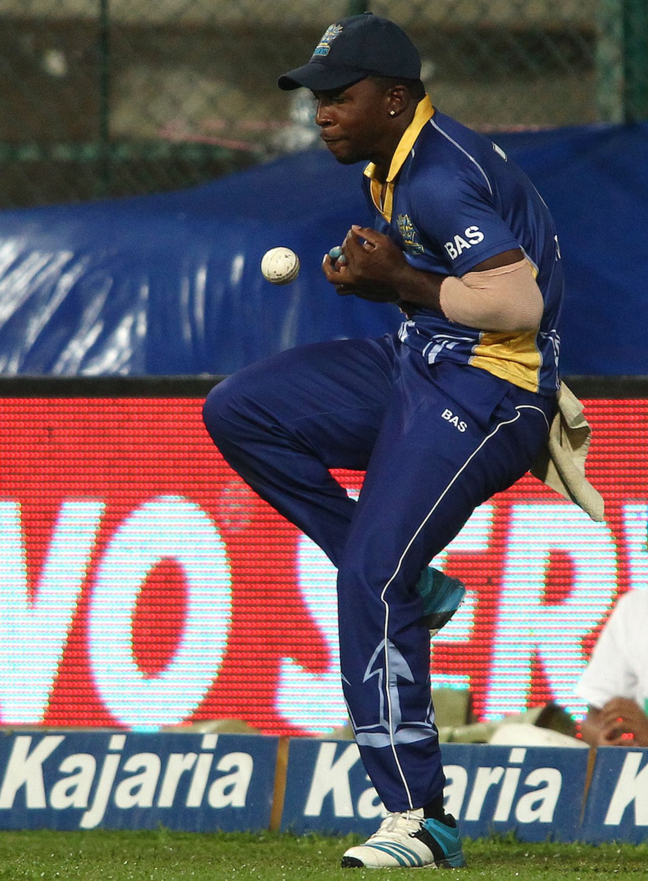 Kyle Mayers fumbles a catch before completing it successfully, Barbados Tridents v Northern Districts, Champions League T20, Group B, Bangalore, September 30, 2014