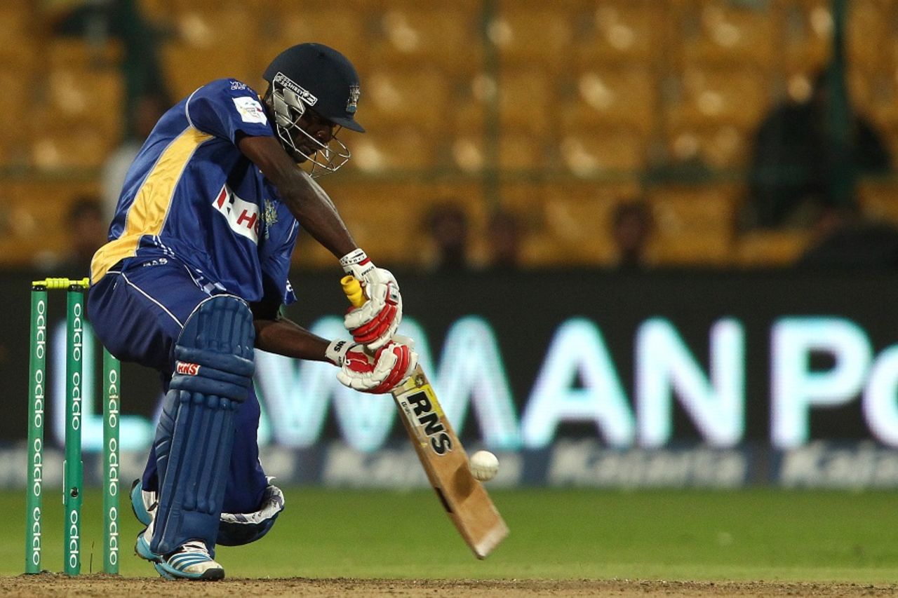 Jonathan Carter drives through the off side, Barbados Tridents v Northern Districts, Champions League T20, Group B, Bangalore, September 30, 2014