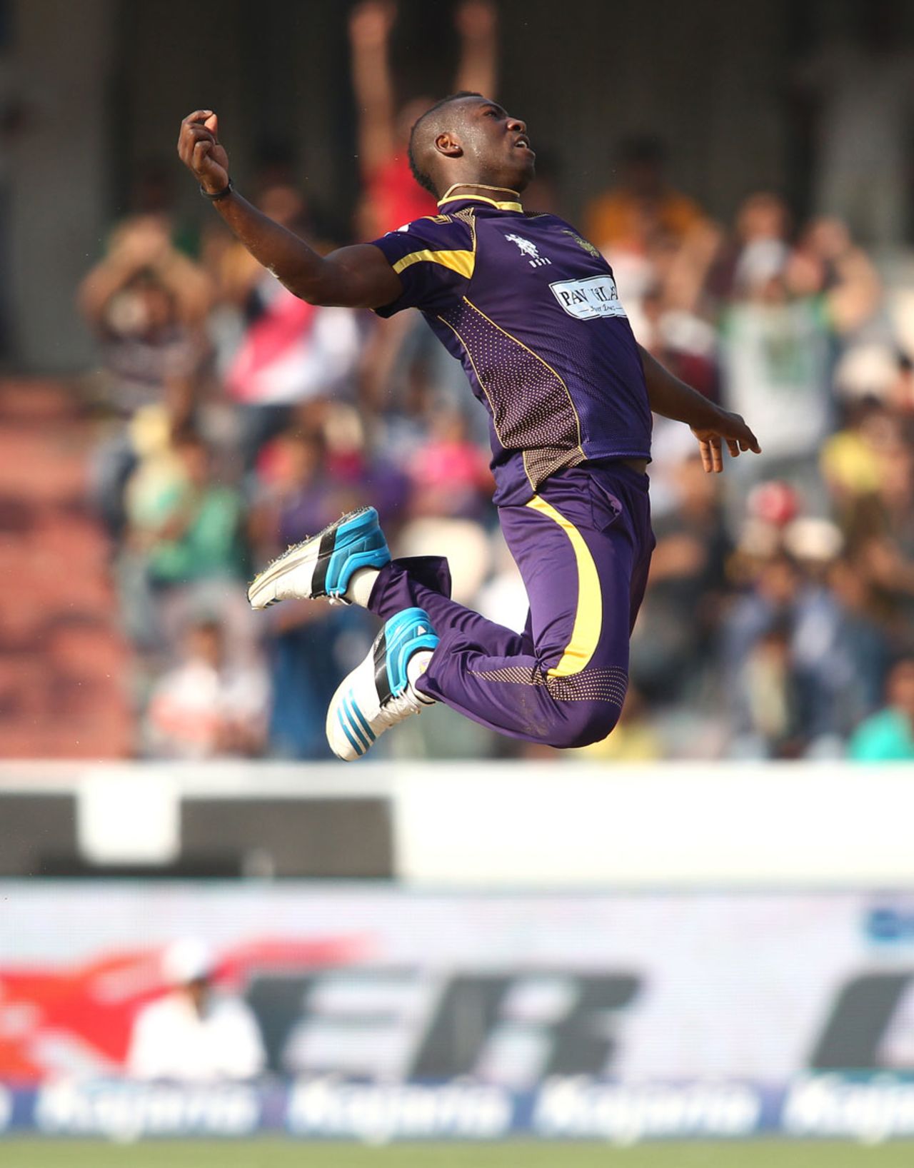 Andre Russell leaps in joy after a wicket, Kolkata Knight Riders v Hobart Hurricanes, 1st semi-final, CLT20, Hyderabad, October 2, 2014