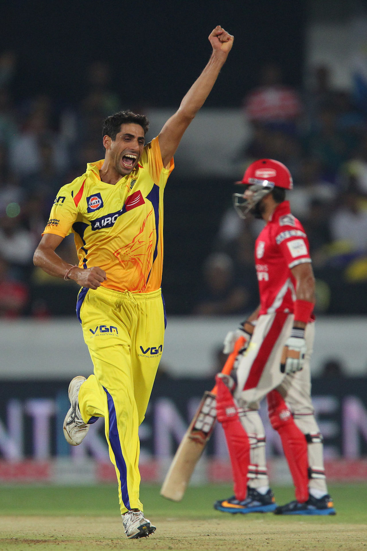 Ashish Nehra is pumped after taking a wicket, Kings XI Punjab v Chennai Super Kings, 2nd semi-final, CLT20, Hyderabad, October 2, 2014