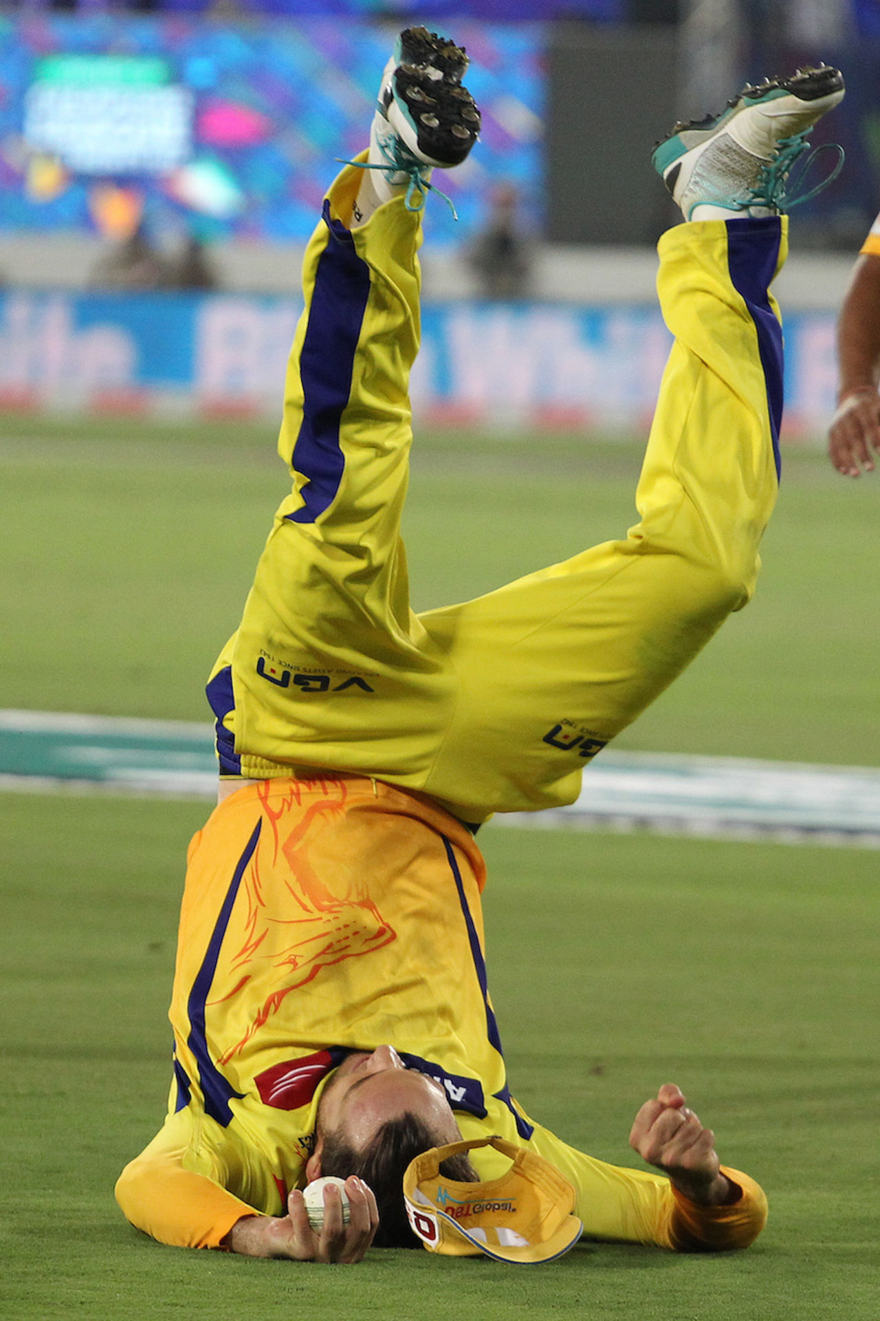Faf du Plessis goes upside down to complete a catch, Kings XI Punjab v Chennai Super Kings, 2nd semi-final, CLT20, Hyderabad, October 2, 2014