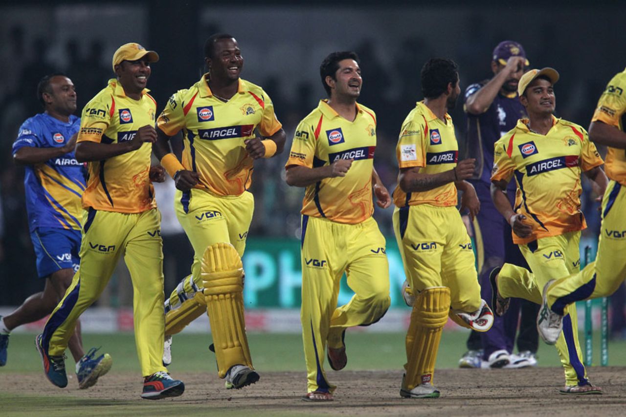The Super Kings players rush to the field to celebrate their fourth major title, Chennai Super Kings v Kolkata Knight Riders, Final, CLT20, Bangalore, October 4, 2014