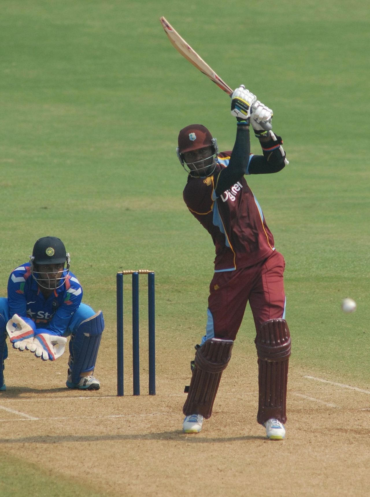 Marlon Samuels punches one down the ground, India A v West Indians, Mumbai, October 3, 2014