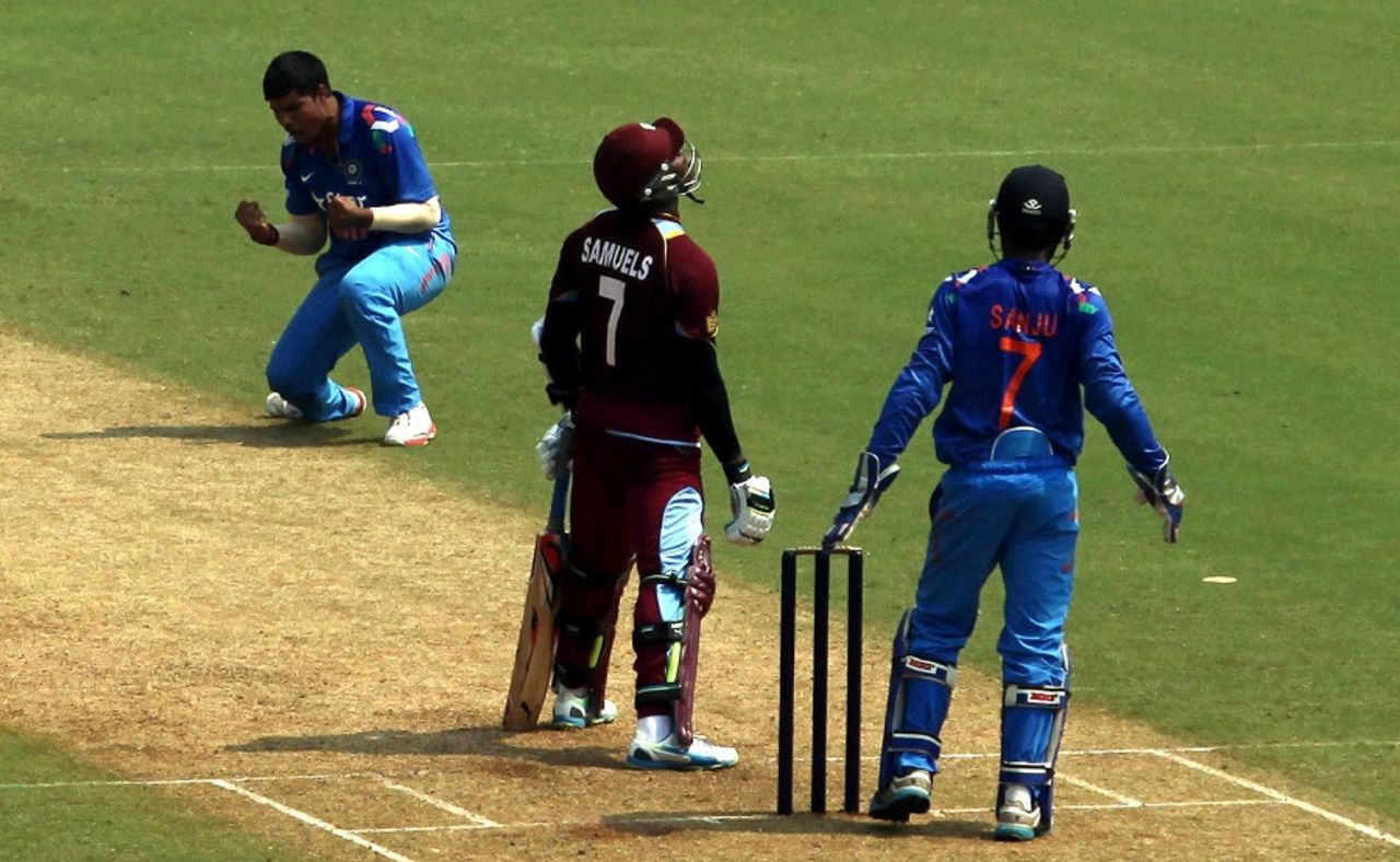 Karn Sharma celebrates the fall of Marlon Samuels, India A v West Indians, Mumbai, October 3, 2014